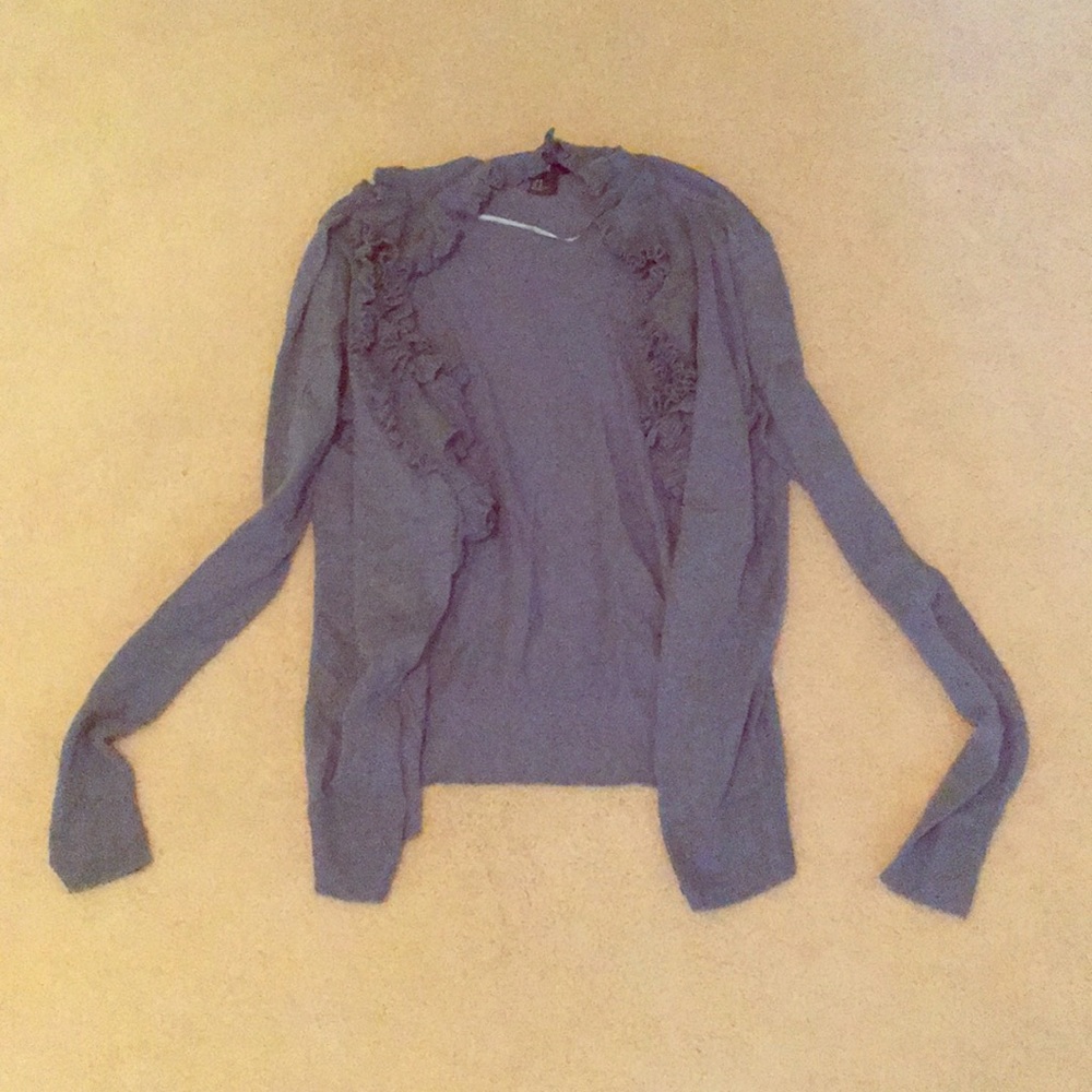 Blue cardigan with ruffled collar